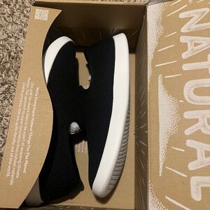 Women’s black slip-on sneakers